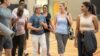 people-leaving-exercise-class-multi-age-gym
